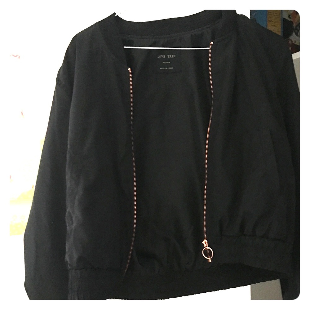 Black short jacket with long sleeves